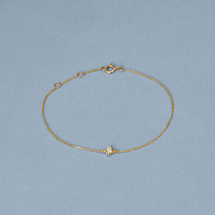 Stone and Strand 14K Yellow Gold Mini Clover Diamond Bracelet Editorial Image