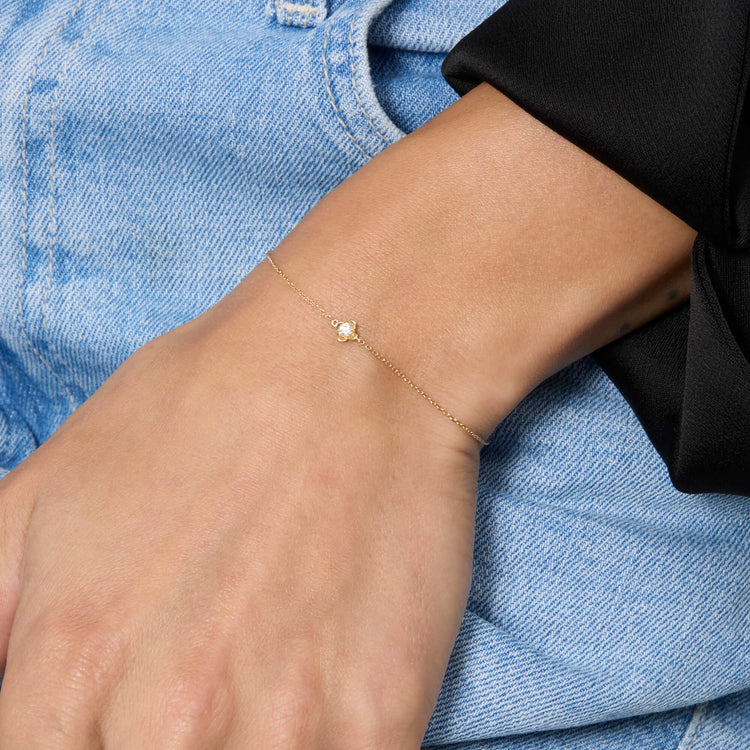 Image of 14K Yellow Gold Mini Clover Diamond Bracelet on Models Arm