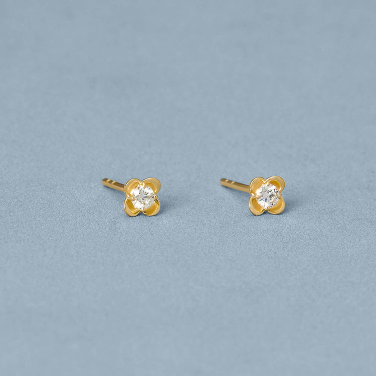 Stone and Strand 14K Yellow Gold Mini Clover Diamond Studs Editorial Image