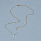 Stone and Strand 14K Yellow Gold Mini Diamond Clover Choker Necklace Editorial Image