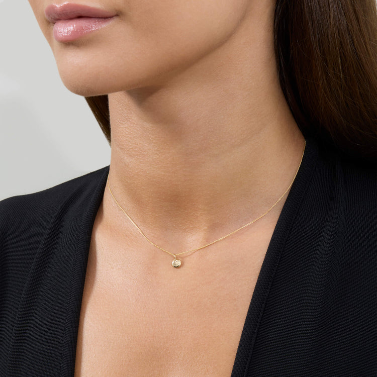 Image of 14K Yellow Gold Mini get Happy Welding Choker on Models Neck