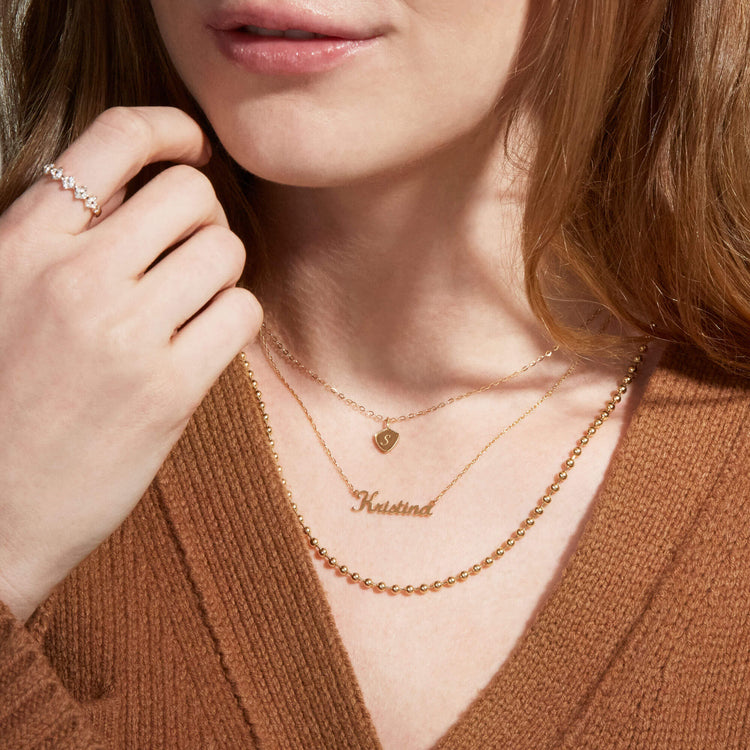 Image of 10K Yellow Gold Engraved Mini Shield Medallion Necklace with Stone and Strand Necklaces