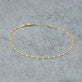 Stone and Strand 14K Yellow Gold Mirror Chain Anklet Editorial Image