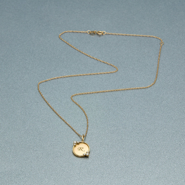Stone and Strand 10K Yellow Gold Mirror, Mirror Initial Necklace Editorial Image