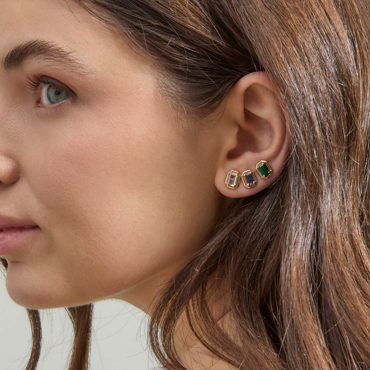 Image of 14K Yellow Gold Birthstone Emerald Cut Bonbon Studs on Models Ear