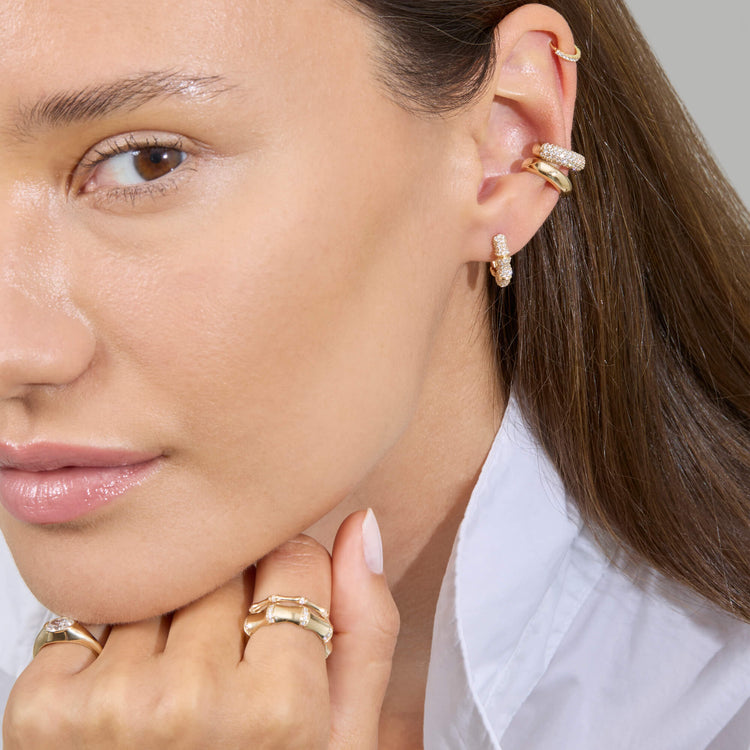Model wearing Diamond Bamboo Resort Ring with solid gold Stone and Strand jewelry