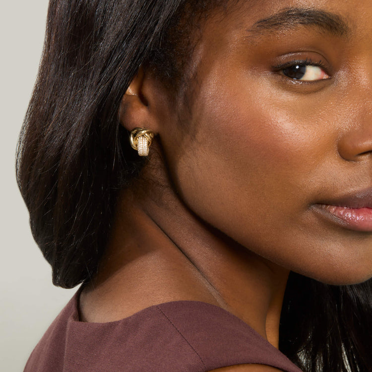 Image of 14K Yellow Gold Diamond Forme Knot Earrings on Models Ear