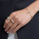 Model wearing Diamond Toggle Link Bracelet with solid gold Stone and Strand jewelry