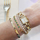 Model wearing Emerald Luxe Bezel Tennis Bracelet with solid gold Stone and Strand jewelry