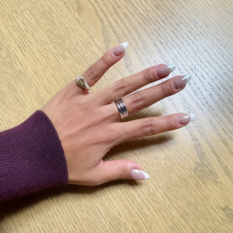 Model wearing Engraveable Pave Shield Signet Ring with solid gold Stone and Strand jewelry