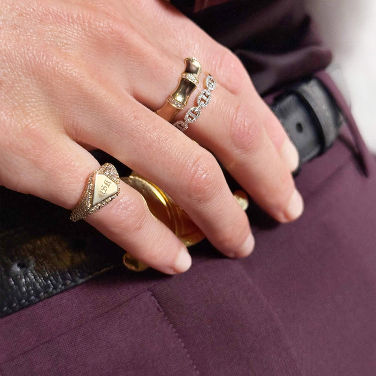 Model wearing Engraveable Pave Shield Signet Ring with solid gold Stone and Strand jewelry