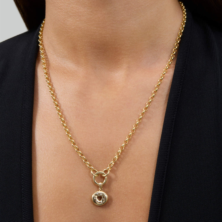 Model wearing Gold Bagel Brunch Charm with solid gold Stone and Strand jewelry