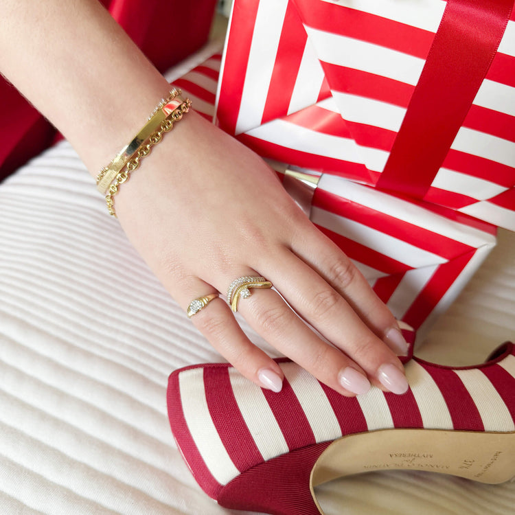 Model wearing Je Ne Regrette Gold Bangle with solid gold Stone and Strand jewelry