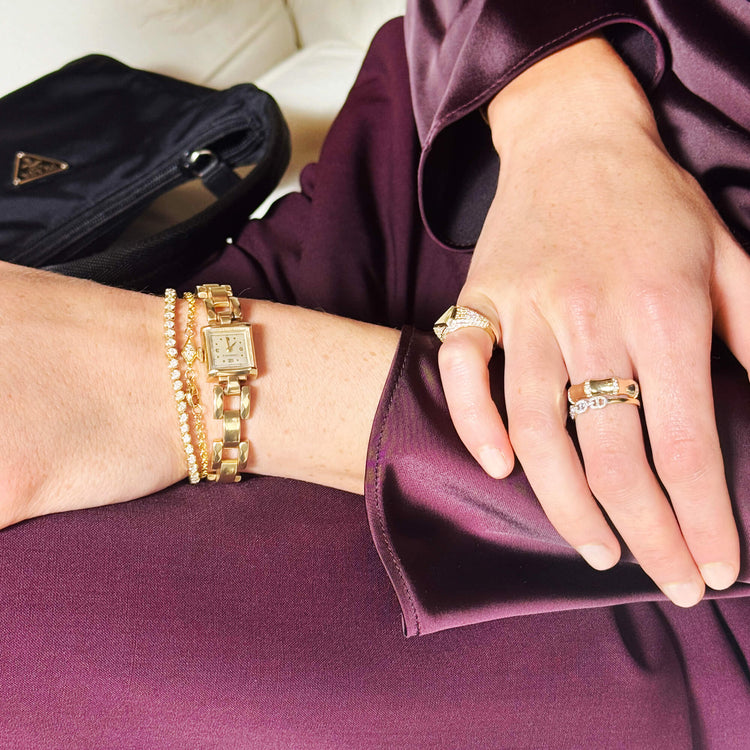 Model wearing Kite Pave Diamond Bracelet with solid gold Stone and Strand jewelry