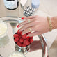 Model wearing Pave Bamboo Eternity Ring with solid gold Stone and Strand jewelry