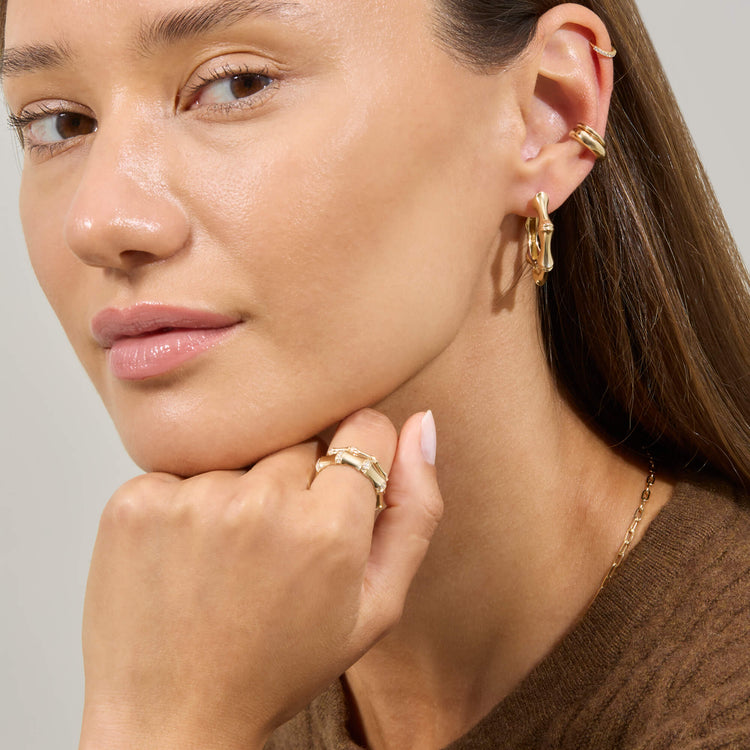 Model wearing Pave Bamboo Eternity Ring with solid gold Stone and Strand jewelry