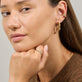 Model wearing Pave Bamboo Eternity Ring with solid gold Stone and Strand jewelry
