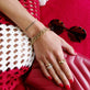 Model wearing Pave Bamboo Eternity Ring with solid gold Stone and Strand jewelry