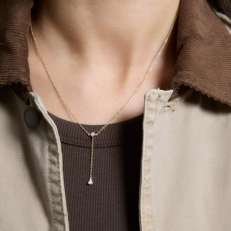 Image of 14K Yellow Gold Perfect Pear Diamond Lariat Necklace on Models Neck