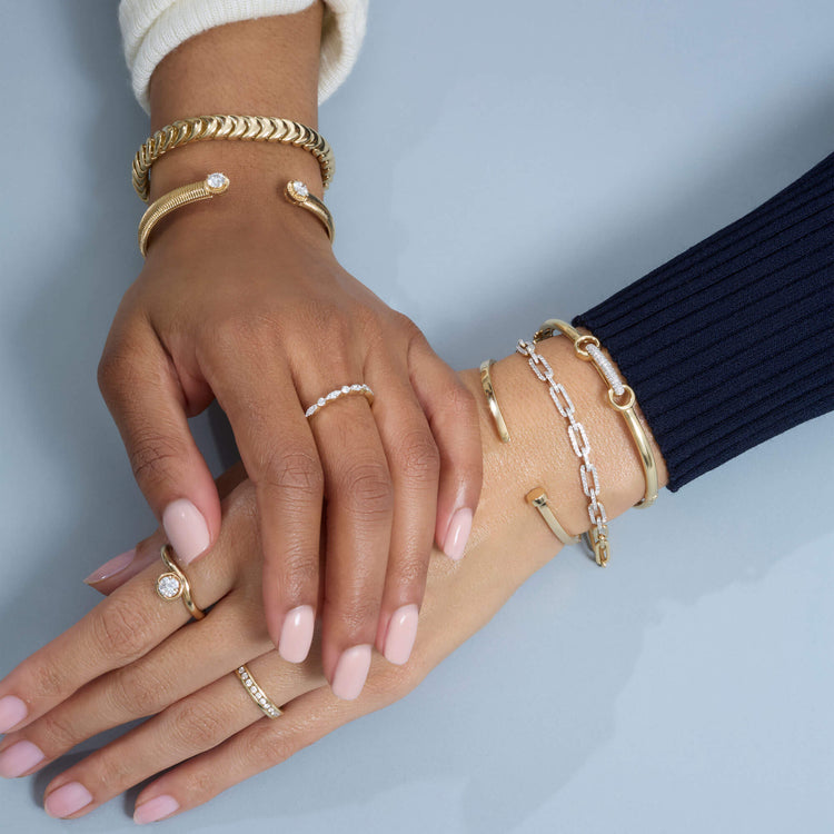 Model wearing Diamond Channel Ring with solid gold Stone and Strand jewelry