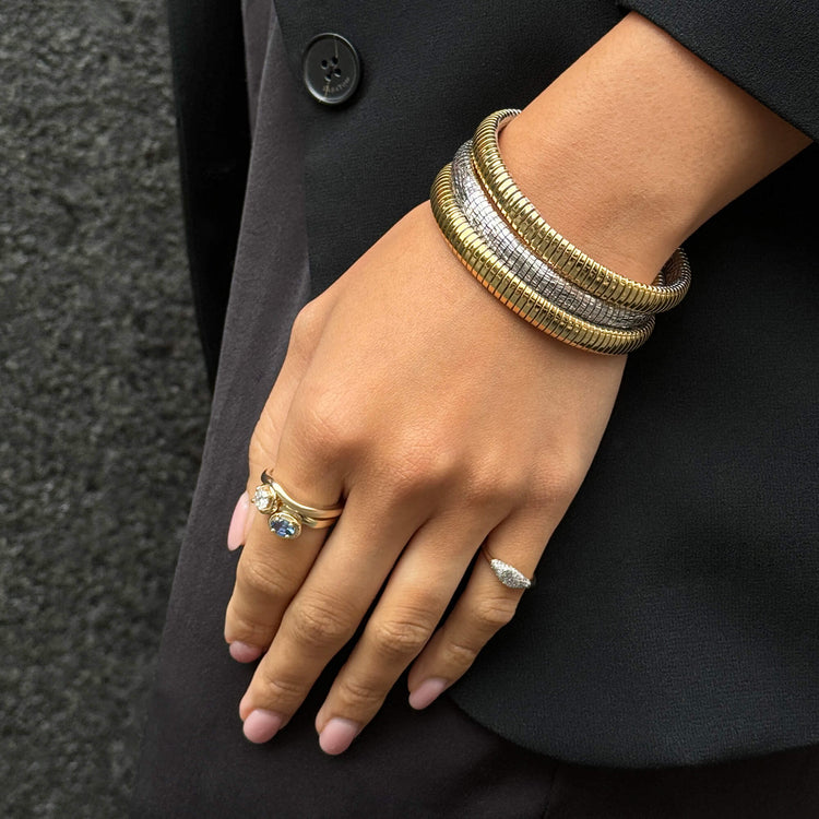 Model wearing Fine Sparkle Mini Signet Diamond Ring with solid gold Stone and Strand jewelry