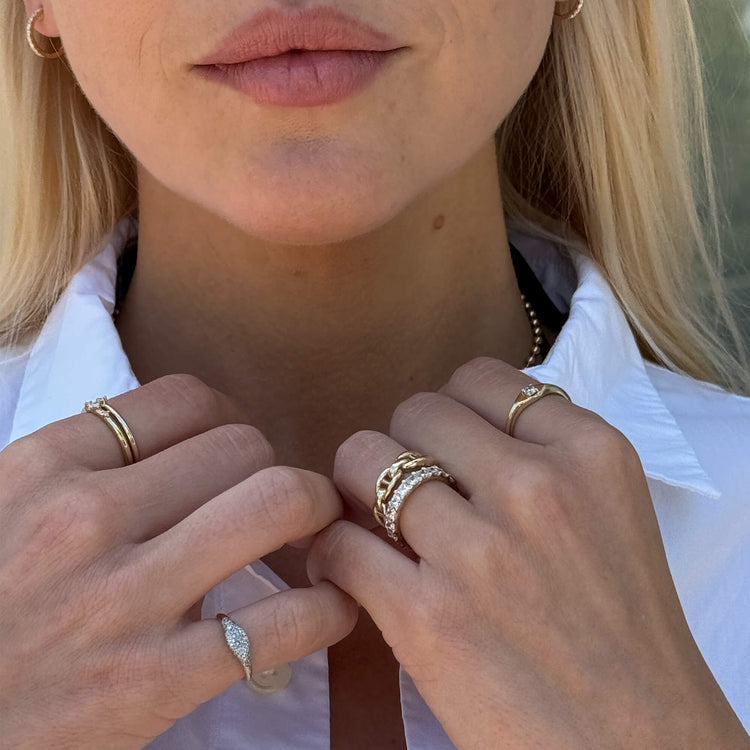 Model wearing Puffed Maritime Ring with solid gold Stone and Strand jewelry