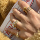 Image of 14K Yellow Gold The Lab-Created Selene Ring with Stone and Strand Rings
