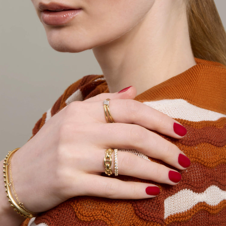 Model wearing Puffed Maritime Ring with solid gold Stone and Strand jewelry