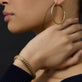 Model wearing Gold La Scala Bracelet with solid gold Stone and Strand jewelry