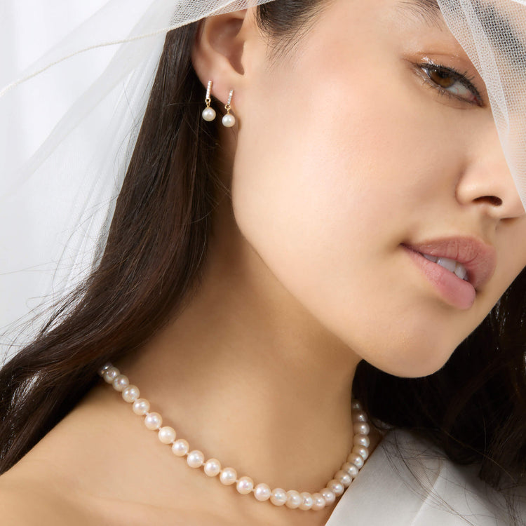 Model wearing Daily Pearl Choker with solid gold Stone and Strand jewelry