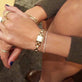 Model wearing The Adjustable Dainty Tennis Bracelet with solid gold Stone and Strand jewelry
