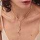 Model wearing Trombone Link Toggle Lariat Necklace with solid gold Stone and Strand jewelry