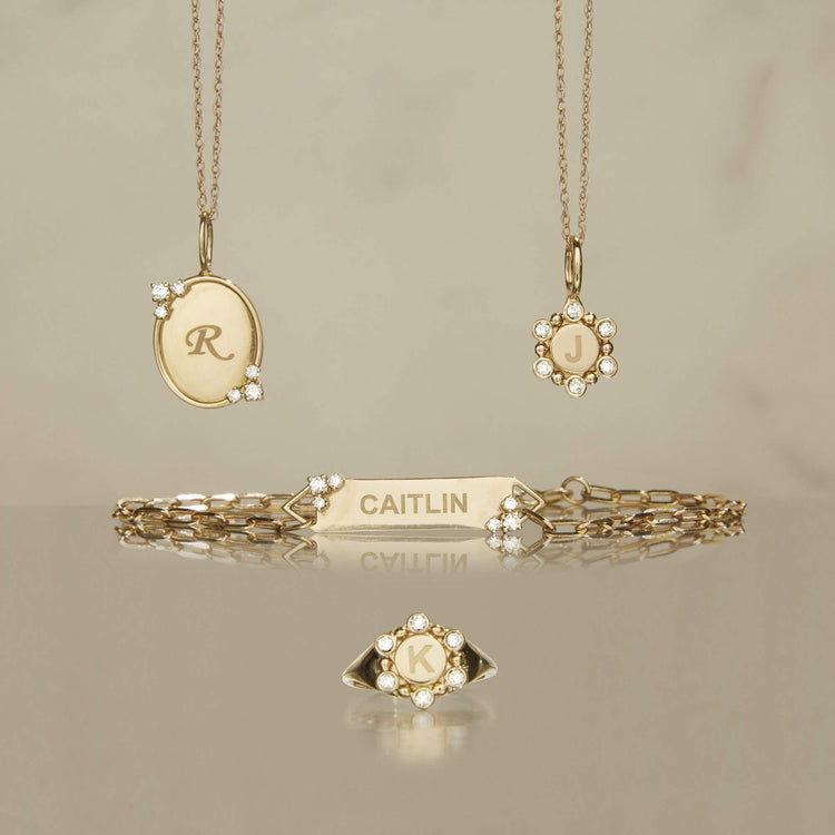 Still life image of Diamond Orbit Pinky Signet Ring with Stone and Strand solid gold jewelry