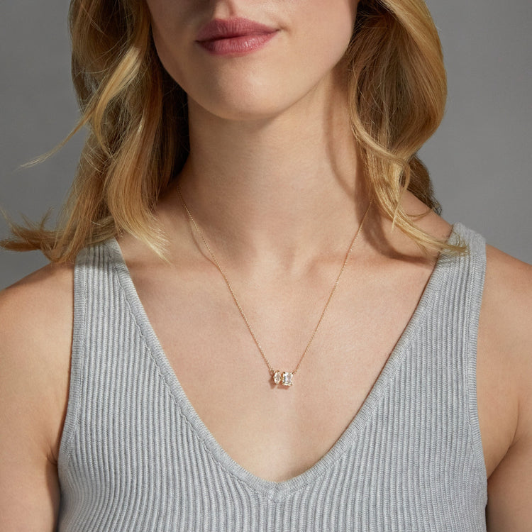 Image of 10K Yellow Gold Marquise and Emerald Moi et Toi Necklace with White Topaz on Models Neck