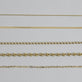 Still life image of Gold Ball Chain Necklace with Stone and Strand solid gold jewelry