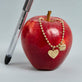 Still life image of Love New York Diamond Charm with Stone and Strand solid gold jewelry