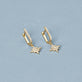 Stone and Strand 14K Yellow Gold Northern Star Pave Huggies Editorial Image