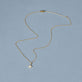 Stone and Strand 14K Yellow Gold Northern Star Pave Necklace Editorial Image