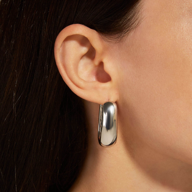 Image of Sterling Silver Oblong Silver Hoops on Models Ear