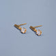Stone and Strand 14K Yellow Gold Pastis Diamond Drop Earrings Editorial Image