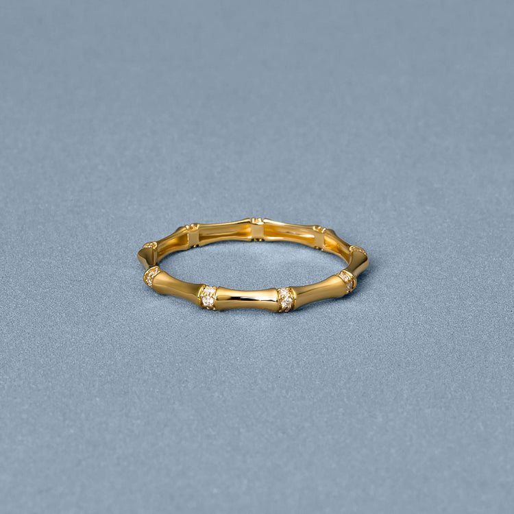 Stone and Strand 14K Yellow Gold Pave Bamboo Eternity Ring Editorial Image
