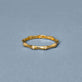 Stone and Strand 14K Yellow Gold Pave Bamboo Eternity Ring Editorial Image