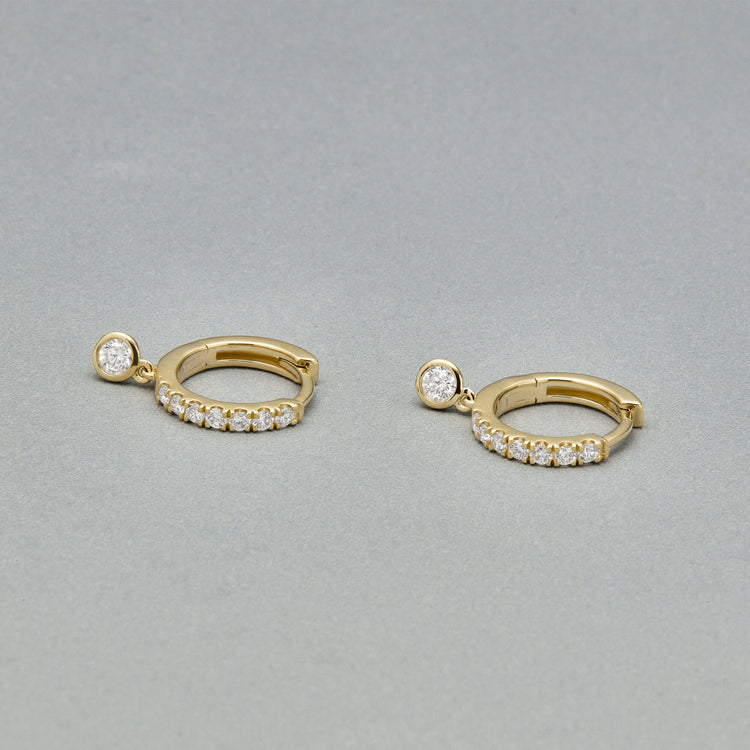 Stone and Strand 14K Yellow Gold Pave Bezel Diamond Drop Huggies Editorial Image