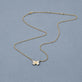 Stone and Strand 14K Yellow Gold Pave Diamond Butterfly Necklace Editorial Image