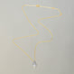 Stone and Strand 14K Yellow Gold Pave Diamond Droplet Necklace Editorial Image