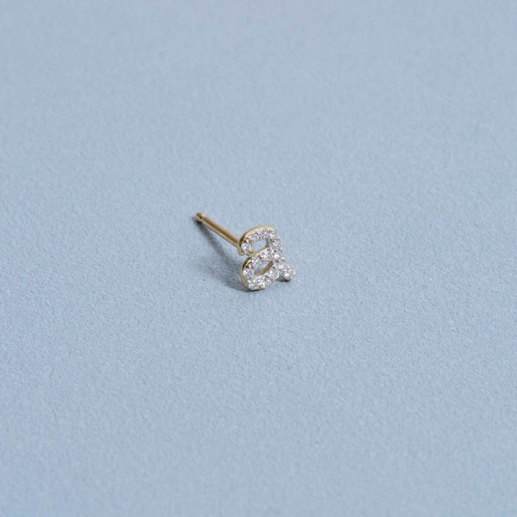 Stone and Strand 10K Yellow Gold Pave Diamond Initial Stud Editorial A Image