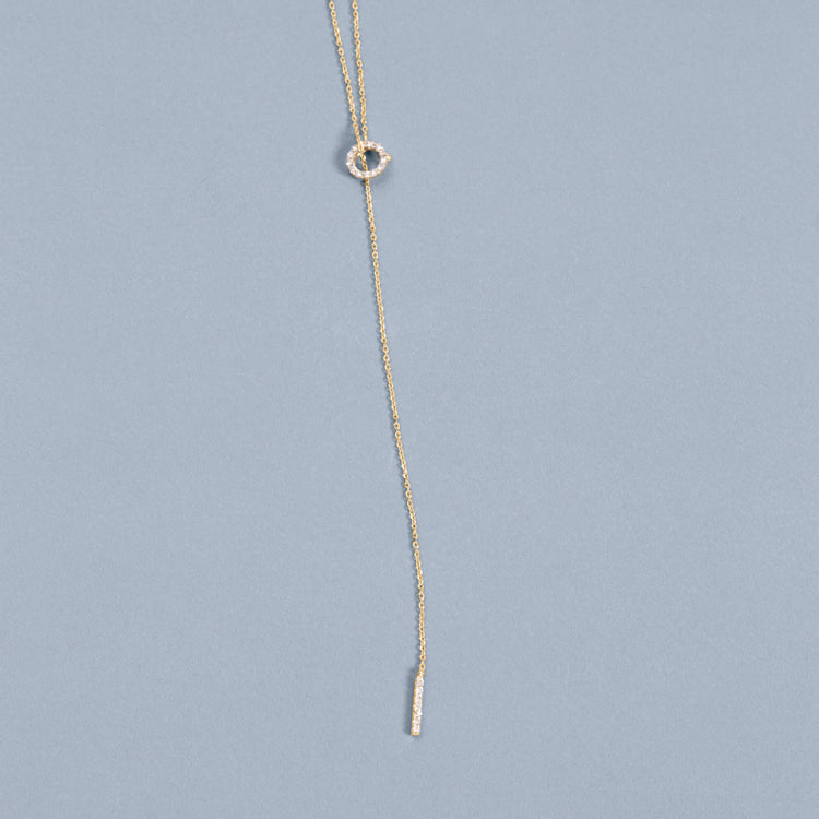 Stone and Strand 14K Yellow Gold Pave Diamond Open Circle Lariat Necklace Editorial Image