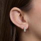 Image of 14K Yellow Gold Pave Knife Edge Wide Huggies on Models Ear