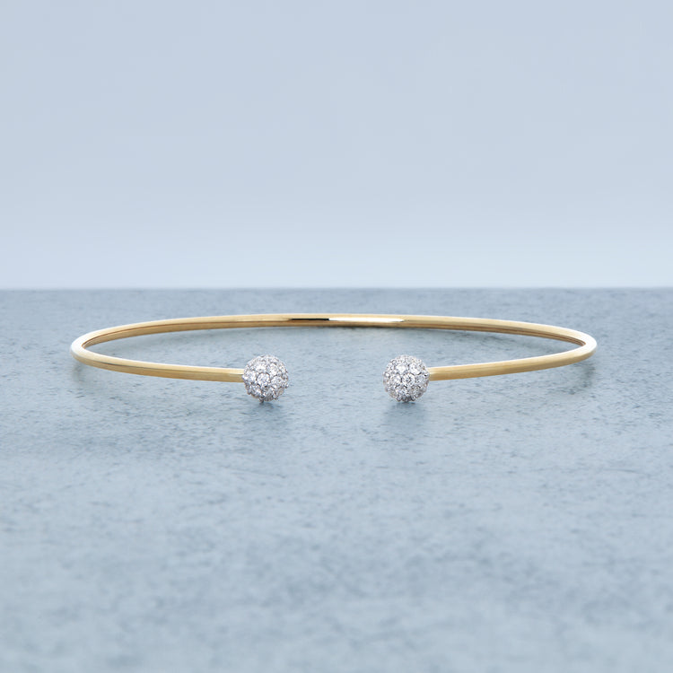 Stone and Strand 10K Yellow Gold Tiny Diamond Disco Dainty Cuff Editorial Image