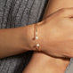 Image of 10K Yellow Gold Tiny Diamond Disco Dainty Cuff on Models Arm